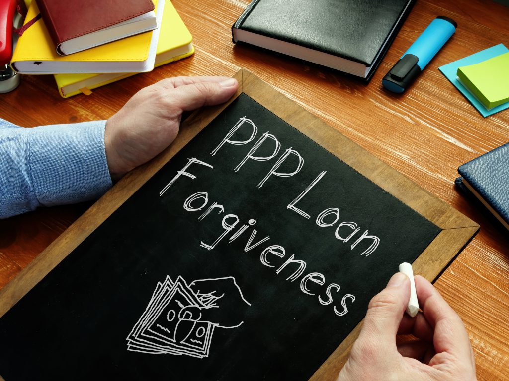 PPP Loan Forgiveness is shown on the conceptual business photo PPP Loan Forgiveness is shown on the conceptual business photo